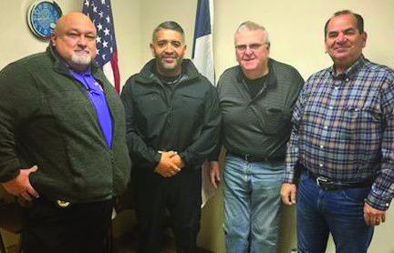 MUNDAY HAS A NEW POLICE OFFICER Pictured here from left Munday Police Chief Albert Deleon, new Officer Rey Bermea, with Mayor Bob Bowen and City Manager David Trevino. | COURTESY PHOTO