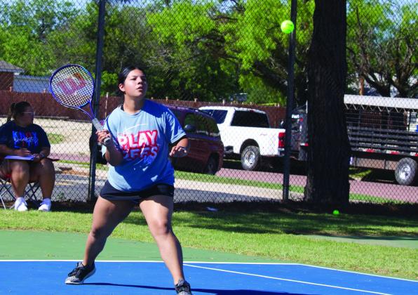 Reyna Alvarez playing in the doubles match. | SHERI BATY PHOTO