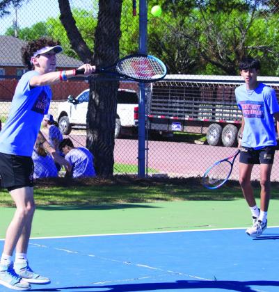 JerryGraysonandJoeAdamMorelosplaytheirmatchatdistricttennis in Stamford. | SHERI BATY PHOTO