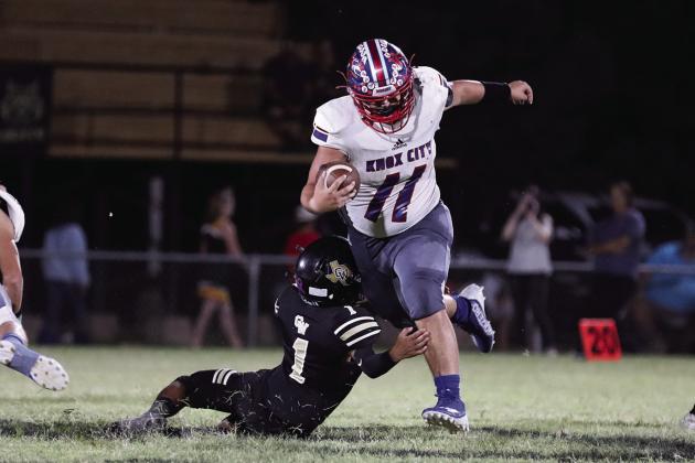 Tristin Baxter breaks the tackle and keeps trucking down the field Sheri Baty/The Knox County News-Courier