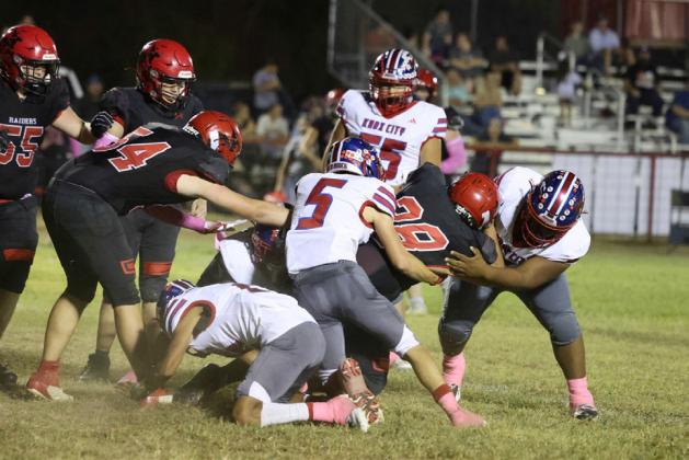 A PACK OF HOUNDS proved too much for the Raiders on Oct. 9, when the Greyhounds took the victory 52-0. | SHERI BATY