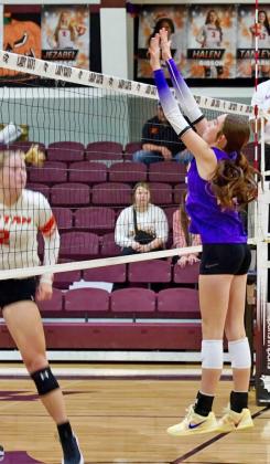 EXCELLENT BLOCKING Munday’s Olivia Myers makes a block at the net. | LACI BOWMAN PHOTO