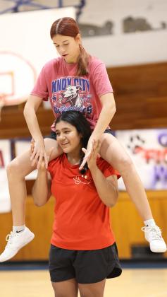 TEAMMATES Hadley Cayce and Kenya Samano make good cheer teammates.
