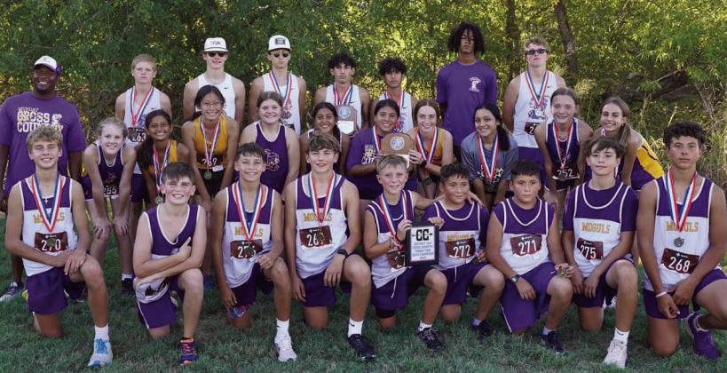DISTRICT CHAMPS The Munday varsity and junior boys XC teams won their district championships this week at Copper Breaks. The varsity girls and junior high girls were district runners-up. | LACI BOWMAN PHOTO