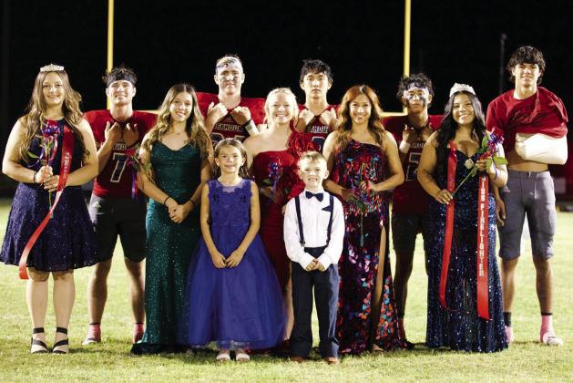 HOMECOMING COURT Back Row (Left to Right): Jay Rick McGaughey, John Cross Utley (Football Hero_, Seth Logsdon (Band Beau), Joe Adam Morelos, Blake Abila. Middle Row (Left to Right): Kylee Stanfield (Band Sweetheart), Railee Arrieta, Krystabel Vasquez, Reyna Alvarez (Miss Firelighter &amp;amp; Football Sweetheart). Front Row: (Escorts) Jaycee Abila and Landon Urbanczyk. | SHERI BATY PHOTO