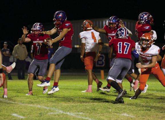 BLOCKED Hayden Swanson blocks the Dragon's PAT. | SHERI BATY PHOTO