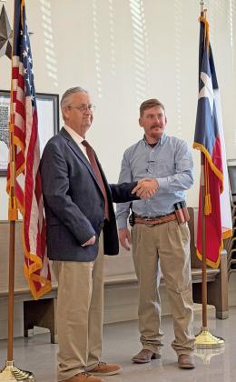 TOSUCCEEDMENDOZA RyanTrash was sworn in as Sheriff by Don Thompson, County Judge following a special meeting of the commissioners court Tuesday morning in Benjamin. Thrash has 12 years of law enforcement experience in Knox County. | COURTESY PHOTO