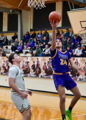 Mance Phillips with a layup to start the scoring for the Moguls. | LACI BOWMAN PHOTO