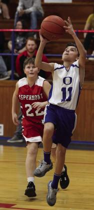 Izaiah Trevino goes up for two points Sheri Baty/The Knox County News-Courier
