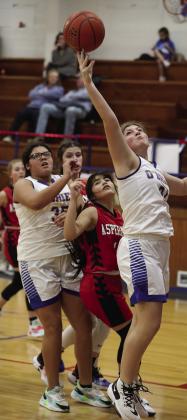 Kateleigh Carr reaches for the rebound Sheri Baty/The Knox County News-Courier