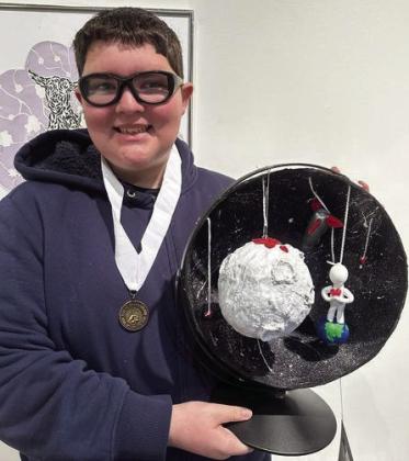 BENJAMIN’S BRAIAN CANO, after overcoming some life challenges, competed in an art competition at Midwestern State University inWichita Falls two weekends ago where he won a gold medal. | COURTESY PHOTO