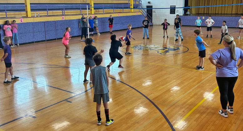 CHAMPS! Munday Elementary (MES) students battle it out for bragging rights in the first annual Newcomb tournament held the last day of school.