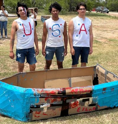 USA! USA! These crewmembers dawned the red, white, and blue looking to win over the judges with their patriotic attire and boat at the boat regatta held at Miller Creek Reservoir.