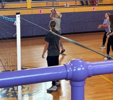 ALL IN Munday elementary principal Kristi Bufkin, loves competition, she skinned both knees diving to make the catch playing Newcomb on the last day of school.