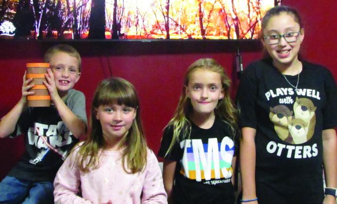 THANKFULWORDS Participants at the City – County LibraryThanksgiving program on Nov. 17 talked about what they are thankful for – (L to R) Harrison Burbank, Krislyn Potter, Riley Burbank, Isabella Andrade. | PHOTO BY DON THOMPSON