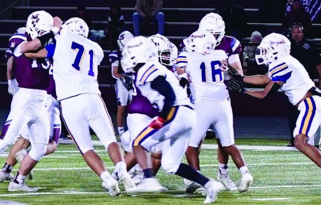 DISAPPOINTING LOSS FOR MUNDAY Moguls defensive lineman Seniors Aaron Quintero, AJ Diaz, and Mance Phillips fought hard against the Seymour Panthers offense but came up short with the Panthers winning the game with a final score of 38 over the Moguls 20. | LACI BOWMAN