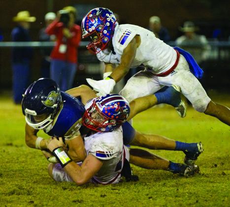 DEFENSIVE STOP The Greyhound defense makes the stop. | SHERI BATY PHOTO