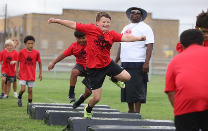 MORETHAN 50 KIDS participated in LJ Collier’s free football camp June 6, at no cost. MORE PHOTOS, PAGE 4 | SHERI BATY PHOTOS