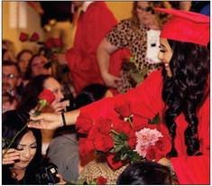 Cielo Sanchez hands out roses to family and friends | SHERI BATY PHOTO