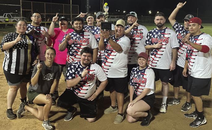 Jones County Sheriff Danny Jimenez (center) proudly displaying the championship trophy after JCSO went undefeated in the Jones County Law Enforcement Softball Tournament, hosted by Bluebonnet Detention Center. | PHOTO COURTESY OF JCSO