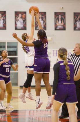 And the playoff season begins as Jaden Baxter tips the ball. | SHERI BATY PHOTO