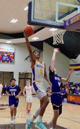 JaRiyis Williams attacks the basket. | LACI BOWMAN PHOTO