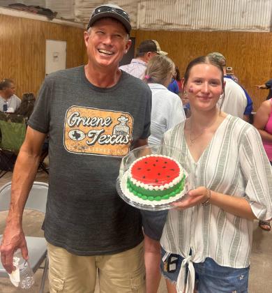 WINNING WALKERS Jay and Brylie Gage shared the spoils of victory won during the cake walk—it’s almost a crime to eat a cake decorated so well!