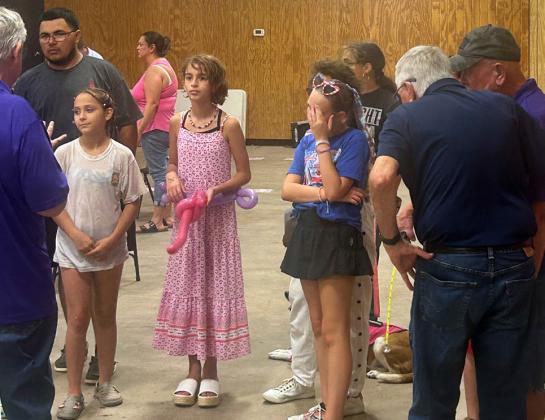SPITTERS AND PITTERS Contestants in the watermelon seedspitting prepared to try out a forgotten art. Gatherings of kids and watermelons always ended up with a seed spitting contest.