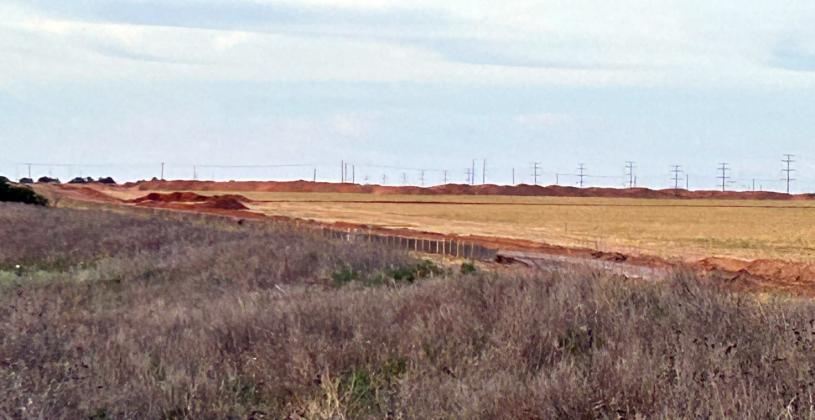 ZSS PUSHES FORWARD The project’s footprint is growing, as the workers continue to prepare for the hardware to arrive: fields are being leveled and roads are being bulldozed.
