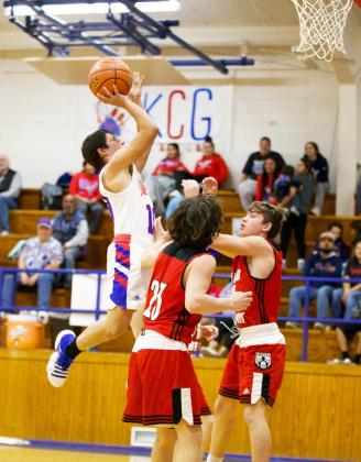 Caleb Arrieta takes to the air for two points. | SHERI BATY PHOTO