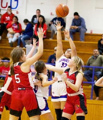 Reyna Alvarez goes up for two and draws the foul. | SHERI BATY PHOTO