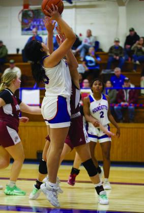 IzaiahTrevino pushes past the defense in a fastbreak | SHERI BATY PHOTO