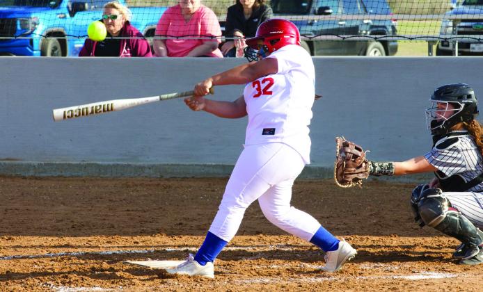 Miley Arrieta makes contact with her bat. | SHERI BATY PHOTO