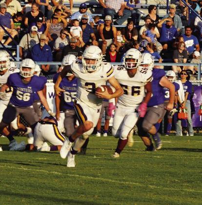 Haiden Bowman runs the ball and gets the Moguls in scoring position.
