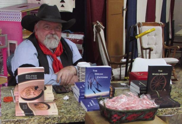Local author Marq Carlton Brockett introduced the third book in his trilogy. | DON THOMPSON PHOTO
