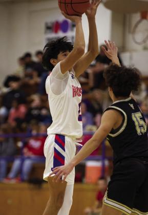 Joe Adam Morelos pushes his way to the net for two | SHERI BATY PHOTO