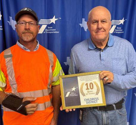 10 YEARS SERVICE AWARD was presented last week to Knox County’s Nathan Herring (left) by TxDOT Childress District Engineer Darwin Lankford. | COURTESY PHOTO
