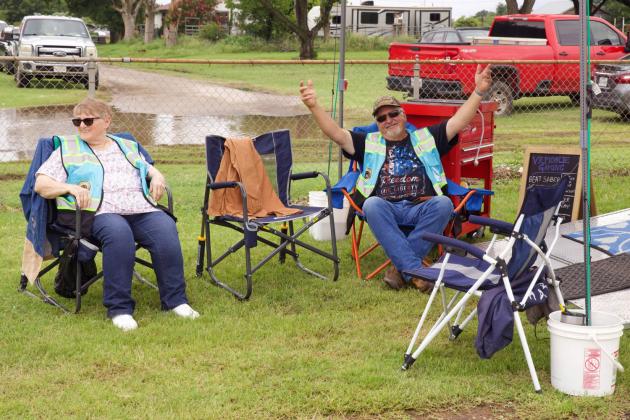 Volunteers (Monte Holmes) attending a booth