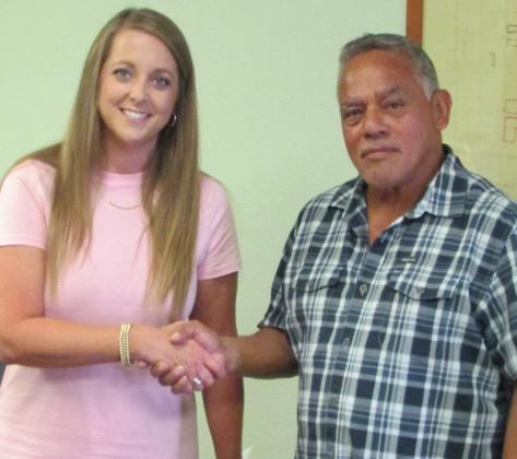 Church of Christ preacher Leroy Torres sworn in as returning City Council member by Municipal Judge Laura Hampel at the Munday City Council meeting on Aug. 8. | DON THOMPSON / NEWS - COURIER