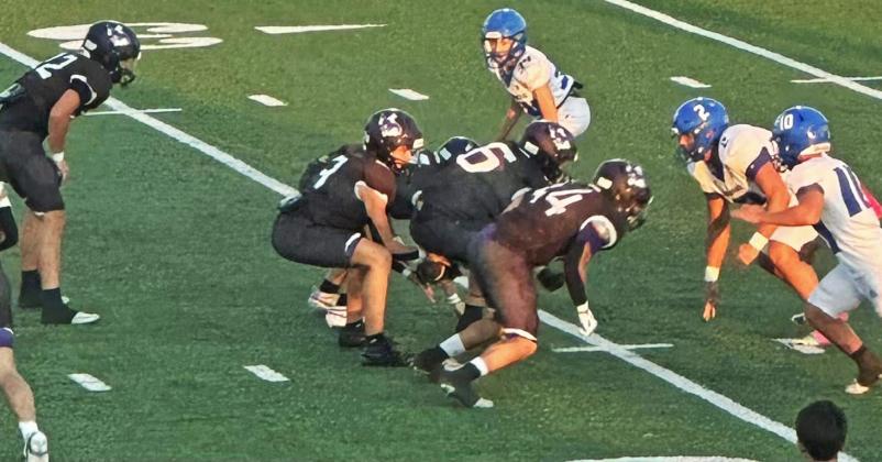 SNAPPING THE BALL The Benjamin Mustangs snap the ball against the Indians in a game where Benjamin dominated play from the opening kick.The Mustangs upset the Indians winning the game with a score of 68-6. | COURTESY PHOTO
