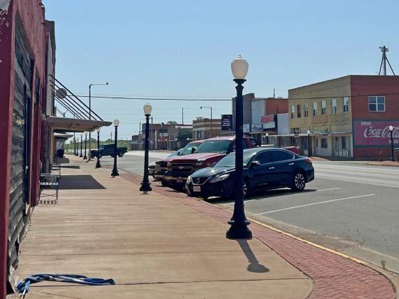 BUSY CORNER This is one of the intersections of concern that have been discussed several times in Munday city council meetings. Discussion has centered about the number of cars parked in front of the building. This Sunday morning the view is clear, once you pull past the stop sign, which is set even with the abandoned storefront. | NEWS-COURIER
