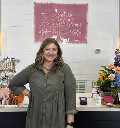 KENNEDY CYPERT is the owner and operator of The Wild Bloom, which just celebrated the grand opening at their new location in Munday Oct. 4. | RACHEL FARMER