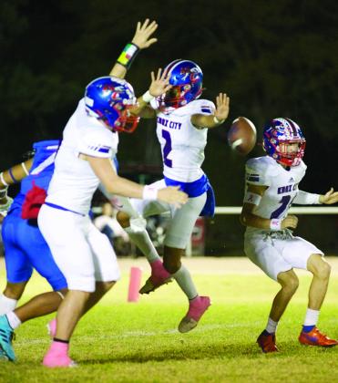 BLOCKED Joe Adam Morelos gets his hand on the ball to block the Patroits PAT. | SHERI BATY PHOTO
