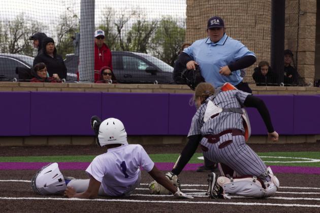 Naveah Martinez safe at home for the score. | SHERI BATY PHOTO