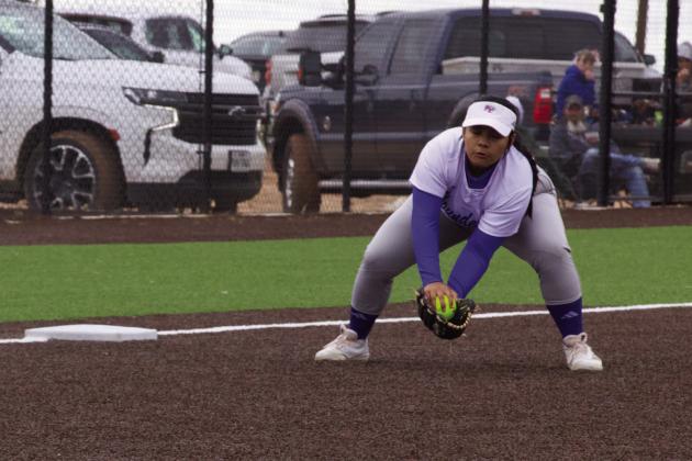 Third Baseman Reyna Alvarez uses her quick hands and throws to first for the out. | SHERI BATY PHOTO