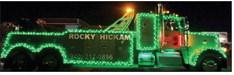 IT’S A GREEN MACHINE A green-decorated float was driven by Rocky Hickam Towing.