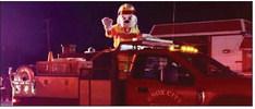 SPARKY ARRIVES Sparky the fire dog arrives in the Knox City VFD truck.