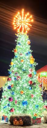 THE TREE IS LIGHTED The Christmas Tree was lit up at the gazebo in Knox City during the 4th annual Christmas Parade and Tree Lighting last Wednesday.