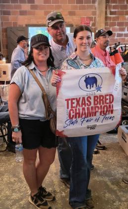TEXASBREDCHAMPION Grayson Utley of Knox City FFA showed her Light Cross OPB in the State Fair of Texas on Oct. 2, winning third place and Texas Bred Champion. | COURTESY PHOTO