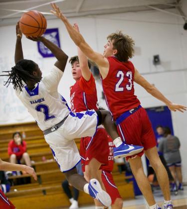 Nicholas Trevino and Bryson Callaway defend the net | SHERI BATY PHOTO
